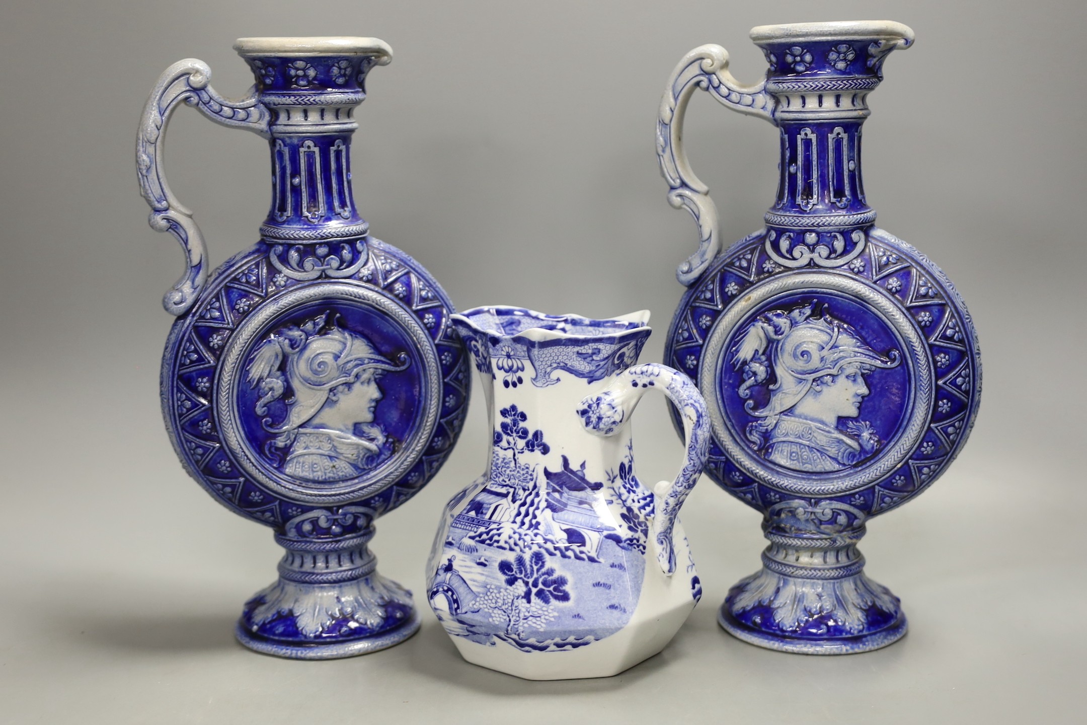 A pair of Royal Copenhagen plates, a pair of German pottery ewers a blue and white dish and pickle dish, plates 25 cms diameter.